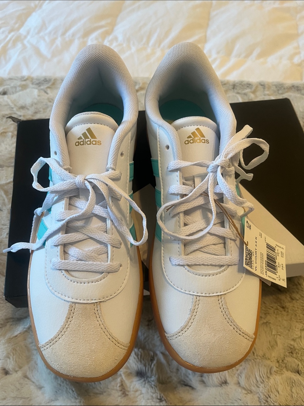 Women’s retro inspired Adidas sneakers.  8.5